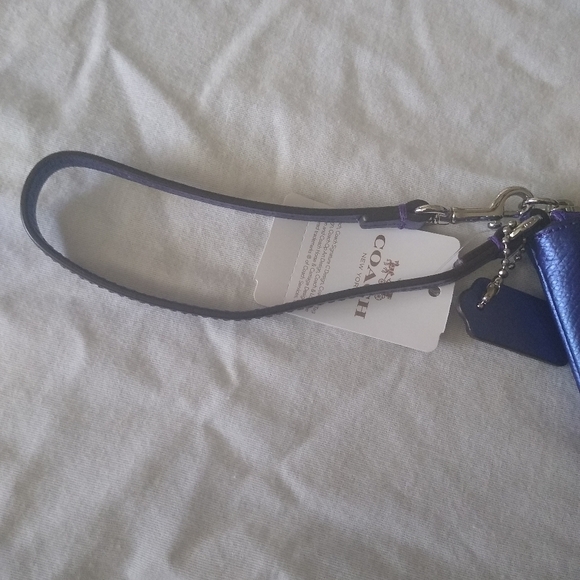 Coach F53429  Crossgrain Leather Corner Zip Wristlet, SV/Metallic Purple… - Picture 11 of 13